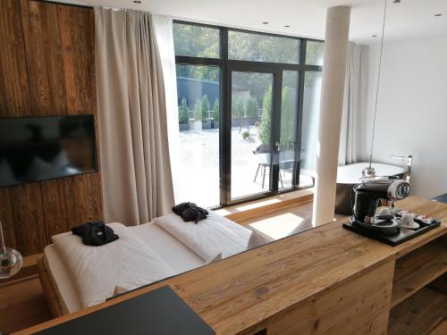 Spa nest with private sauna - panoramic view of the sunny side with terrace