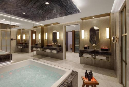 Two-Bedroom Luxury Royal Suite with Private Jacuzzi and Experience Shower – Free In-Room Breakfast & VIP Parking