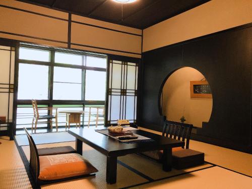 Japanese-Style Deluxe Room with Shared Bathroom - "Chikyu" - Room Only