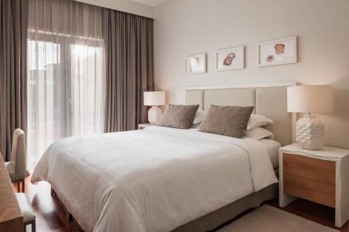 Premium Four-Bedroom Residence with Balcony and Garden View