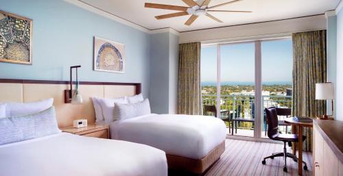 Room with Two Queen Beds, Balcony and Partial Ocean View