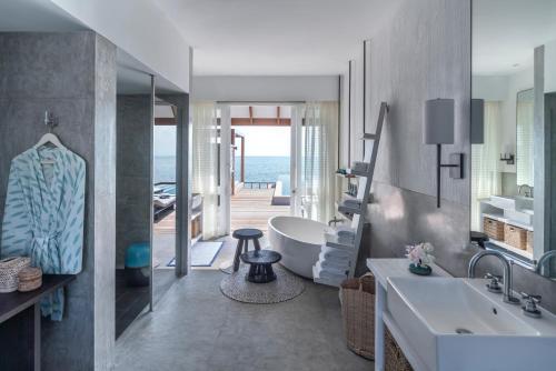 Water Villa with Pool and Partial Sea View - Room Rate inclusive of breakfast for 2 adults