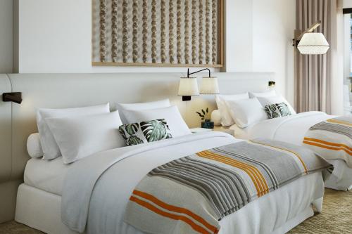 Partial Ocean View Two Queen Hearing Accessible