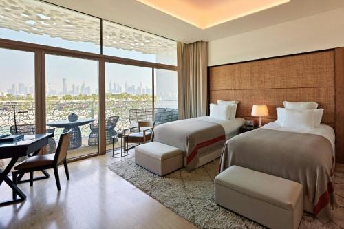 Deluxe Guest Room with 2 Queen Beds, Beach View with Balcony