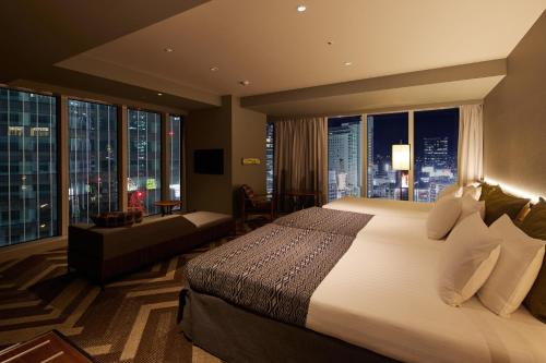 Deluxe Corner Twin Room - Extra Bed for more than 3 Adults