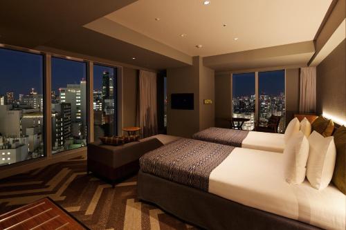 Superior Corner Twin Room with City View - Extra Bed for more than 3 Adults