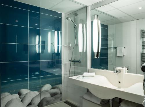 Classic sea side room with one queen size bed located on the upper floor