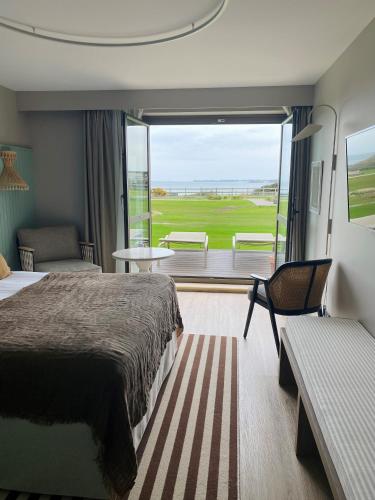 Deluxe Double Room with Sea View -  Garden Floor