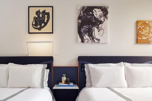 Deluxe Queen Room with Two Queen Beds and City View