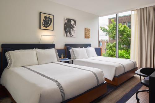 Queen Room with Two Queen Beds, Water View and Roll-in Shower - Disability Access