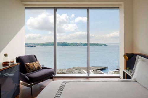 Deluxe Queen Room with Two Queen Beds and Water View