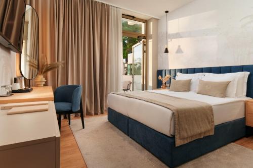 Premium Double or Twin Room with Sea and Pool view with a Balcony - Ground Floor