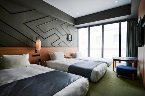 Moderate Twin Room Japanese-Style with Sofa Bed - Non-Smoking (3 adults)