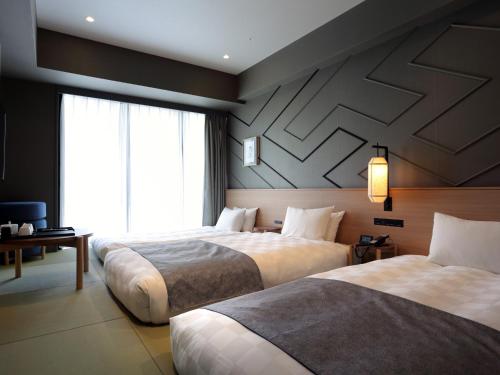 Moderate Twin Room Japanese-Style with Sofa Bed - Non-Smoking (3 adults)