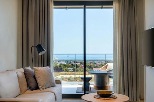 Two-Bedroom Suite with Balcony and Sea View