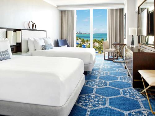 Deluxe 2 Queen Room with  Partial Ocean View 