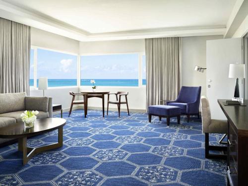Two-Bedroom King Suite with Partial Ocean View and Sofa Bed