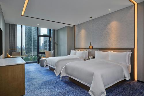 Superior Queen Room with Two Queen Beds and City View
