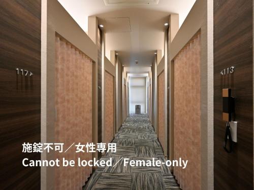 Single Bed in Female Dormitory Room