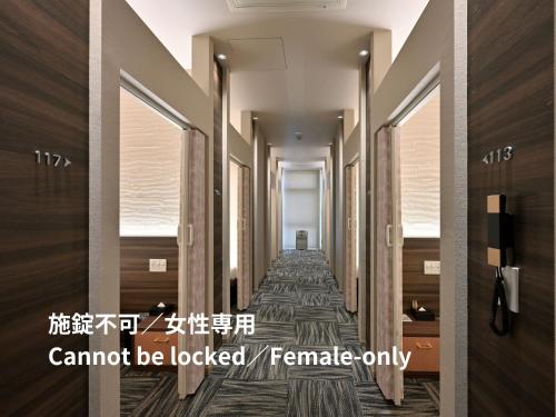 Single Bed in Female Dormitory Room