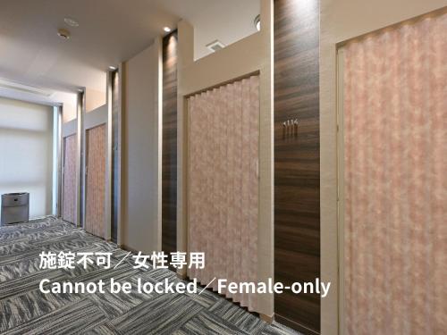 Single Bed in Female Dormitory Room