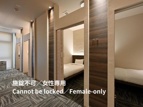 Single Bed in Female Dormitory Room