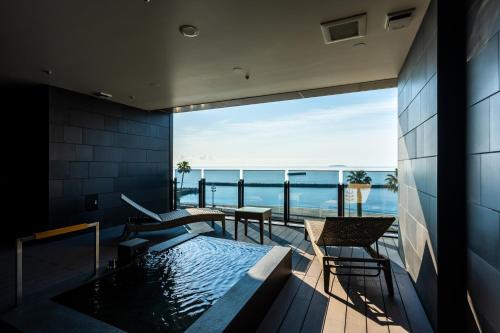 Deluxe Twin Room with Tatami Area and Open-Air Bath - Ocean View