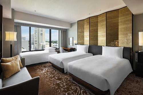 Deluxe Double Room with Two Single Beds and One Extra Bed