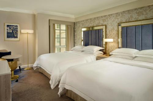 Deluxe Double Room with Two Double Beds and Atrium View
