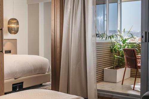 One-Bedroom Twin Suite with Sofa Bed and Balcony