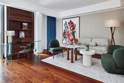 Deluxe Corner King Room with Sofa Bed