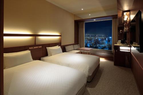Twin Room with Sofa Bed - Non-Smoking
