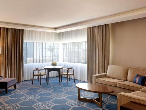 One Bedroom Suite with Two Queen Beds and Parlor with Sitting Area