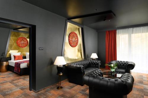 Junior King Suite with Separate Living Room and Pool View
