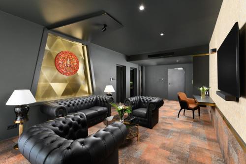 Junior King Suite with Separate Living Room and Pool View