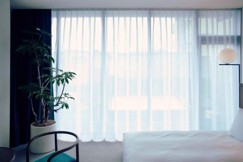 Standard Twin Room with Lounge Access - designed by Tadao Ando