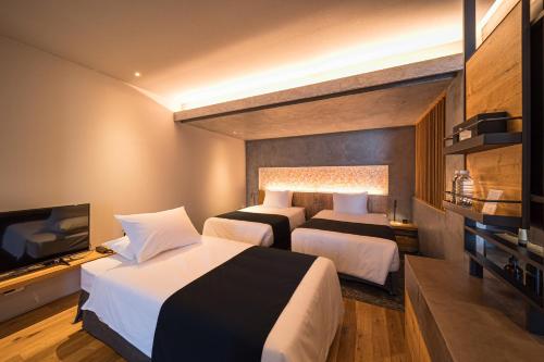 Twin/Triple Room (1-2F) with Semi Open-Air Bath (47㎡) Non-Smoking