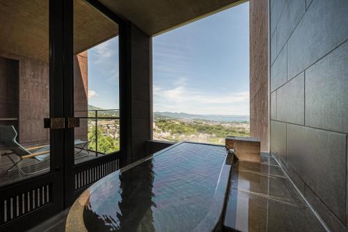 Deluxe Twin/Triple Room (3-4F) with Semi Open-Air Bath (47㎡) Non-Smoking