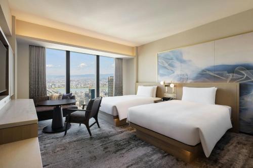 Specialty Twin Room with Two Double Beds and City View - Top Floor