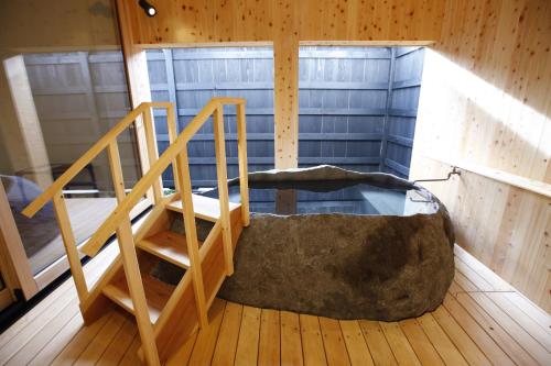 Designer Quadruple Room with Open-Air Bath - First Floor
