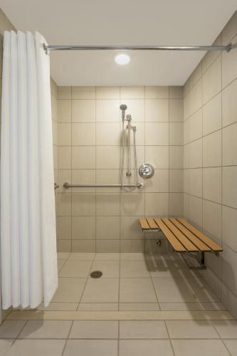 Superior Suite, Corner King, with City View - High Floor/Mobility/Hearing Accessible with Roll-In Shower