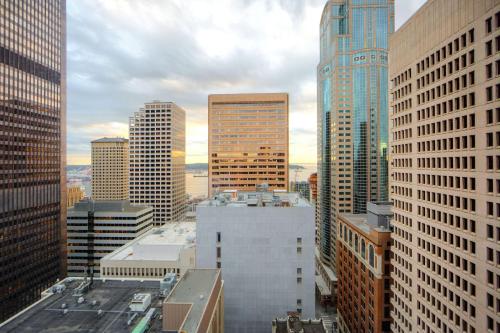 Superior Suite, Corner King, with City View - High Floor/Mobility/Hearing Accessible with Roll-In Shower
