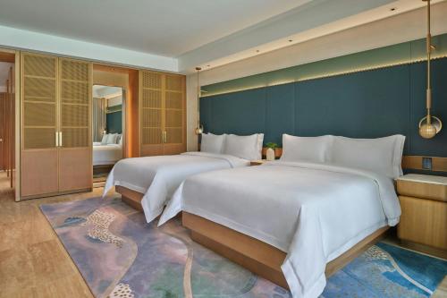 Queen Room with Two Queen Beds and Pool Access