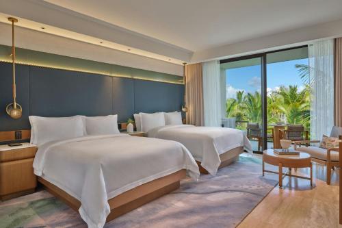 Deluxe Queen Room with Two Queen Beds and Partial Ocean View/Balcony