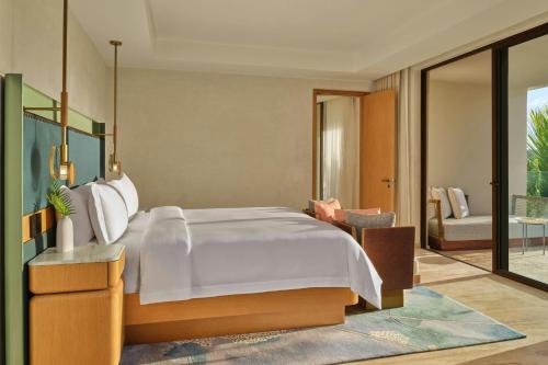 Signature One-Bedroom King Suite with Partial Ocean View