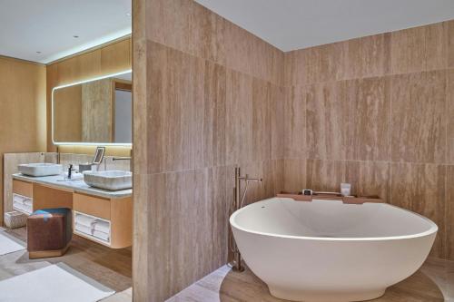 Signature One-Bedroom King Suite with Partial Ocean View