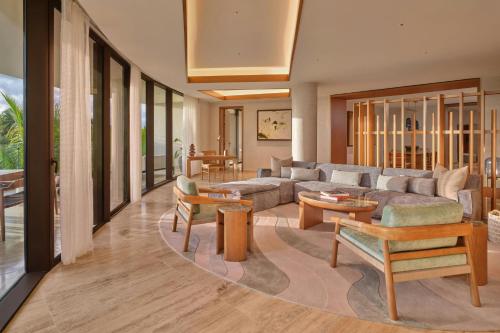 Signature One-Bedroom King Suite with Partial Ocean View