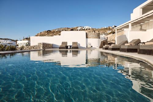 Deluxe Quadruple Room with heated sharing pool