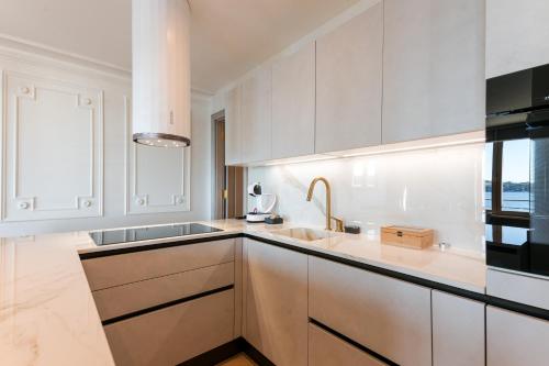 Three-Bedroom Apartment with Sea View