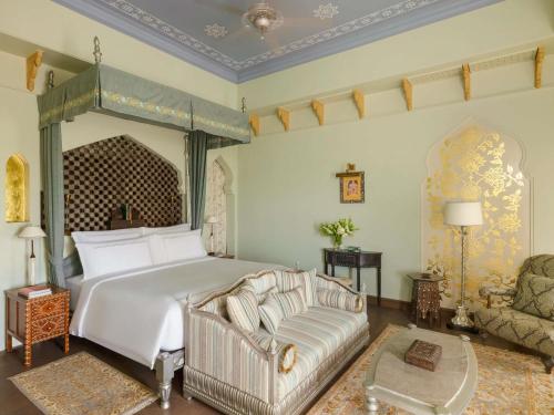 Rajmata Two-Bedroom Presidential Suite with Pool: Airport Transfers in luxury vehicle, 01 Bottle of champagne, INR 5000 hotel credit once during the stay. One 60-minute spa therapy for couple, Evening Hi-Tea at Safir/ Sundowner session with Bartender for